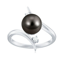 Tahitian black pearl bypass engagement ring with diamonds by Rosec Jewels, showcasing the elegant ring design and dark pearl centerpiece.