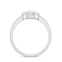 6mm round moissanite solitaire engagement ring in bezel setting by Rosec Jewels, showcasing a sparkling gemstone and sleek band.