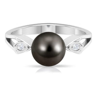 Solitaire Tahitian pearl engagement ring with diamond accents by Rosec Jewels, featuring a sleek, contemporary design.