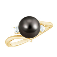 Natural Tahitian black pearl and diamond vintage engagement ring from Rosec Jewels, featuring intricate metalwork and a classic design.