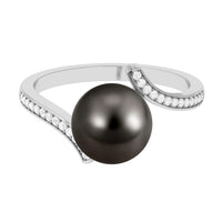 Tahitian pearl bypass engagement ring with diamonds by Rosec Jewels, featuring a lustrous pearl and sparkling diamond accents.