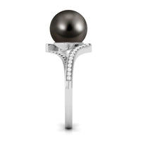Tahitian pearl bypass engagement ring with diamond accents from Rosec Jewels, featuring a unique curved design.