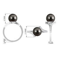 Tahitian pearl bypass engagement ring with diamond accents from Rosec Jewels, showcasing elegant design and fine craftsmanship.