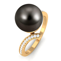 Tahitian pearl bypass engagement ring with diamond accents by Rosec Jewels, featuring a sleek design and sparkling gemstones.