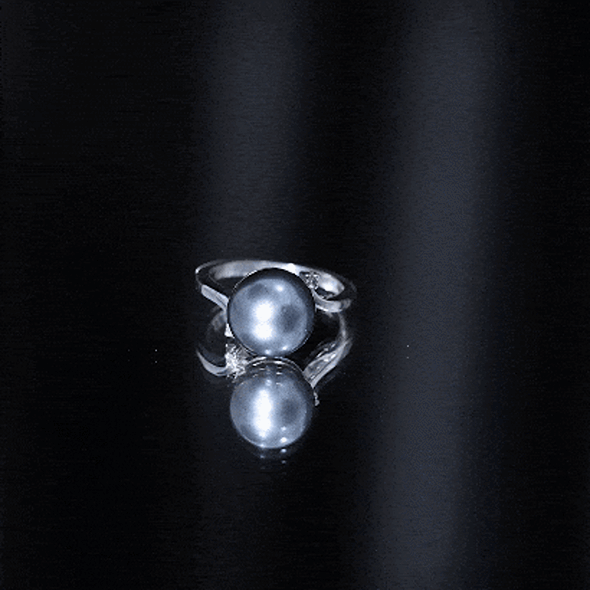 8-carat Tahitian pearl bypass engagement ring with diamond accents from Rosec Jewels, featuring a sleek silver band and elegant design.