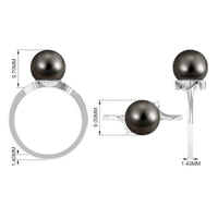 8 carat Tahitian pearl bypass engagement ring with diamond accents, showcasing elegant design and sparkling gemstones.
