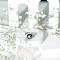 8 Carat Tahitian Pearl bypass engagement ring with diamond from Rosec Jewels, featuring a sleek design and lustrous black pearl.