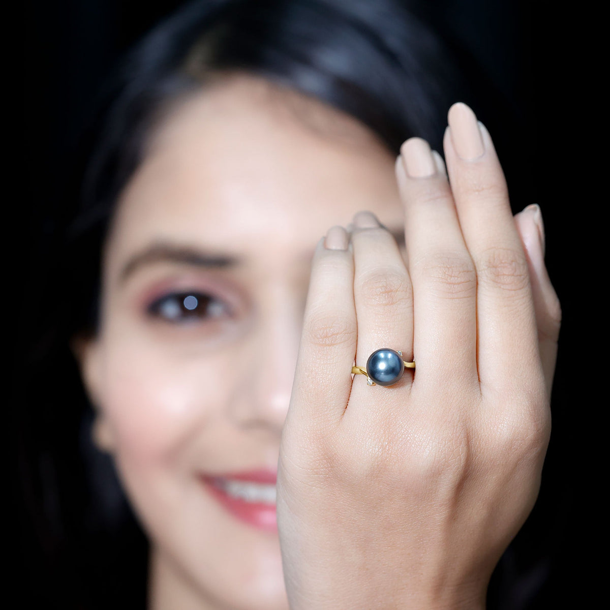 8 carat Tahitian pearl solitaire bypass engagement ring with diamonds, featuring a sleek silver band from Rosec Jewels.
