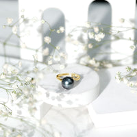8 carat Tahitian pearl bypass engagement ring with diamonds by Rosec Jewels, showcasing the elegant pearl and sparkling accents.