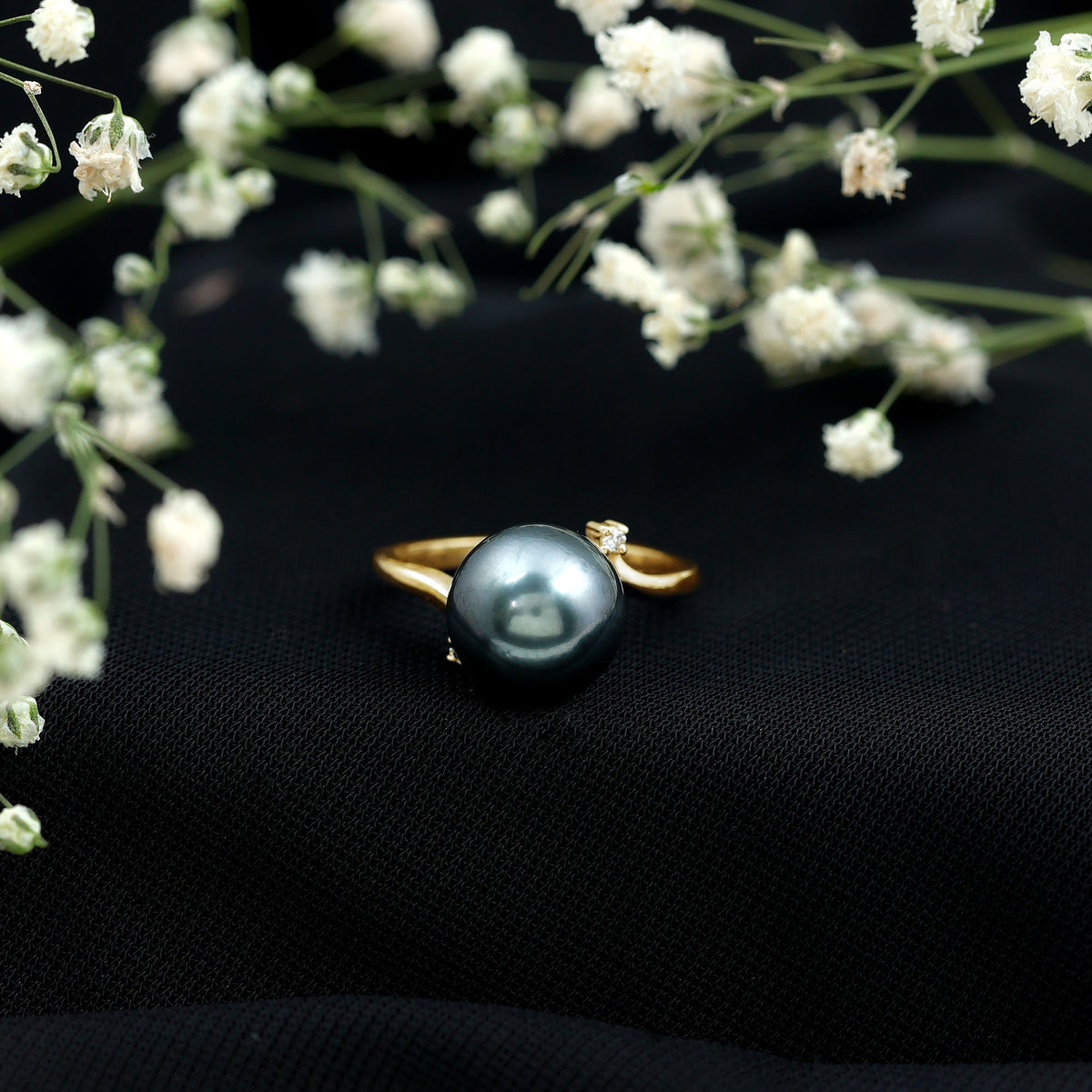 8 carat Tahitian pearl bypass engagement ring with diamond accents, featuring a sleek rose gold design by Rosec Jewels.