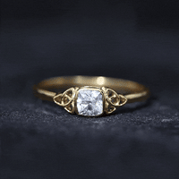 Brilliant Cut Moissanite Celtic Knot Engagement Ring in Bezel Setting
