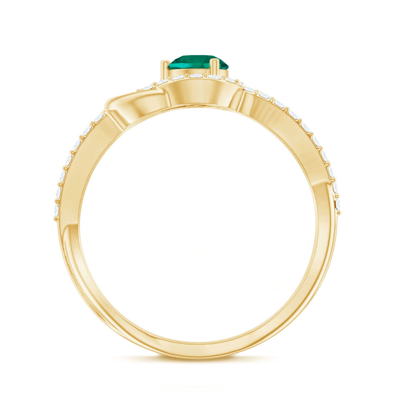 Lab-created emerald infinity promise ring with diamonds by Rosec Jewels, featuring green emeralds and sparkling accents.