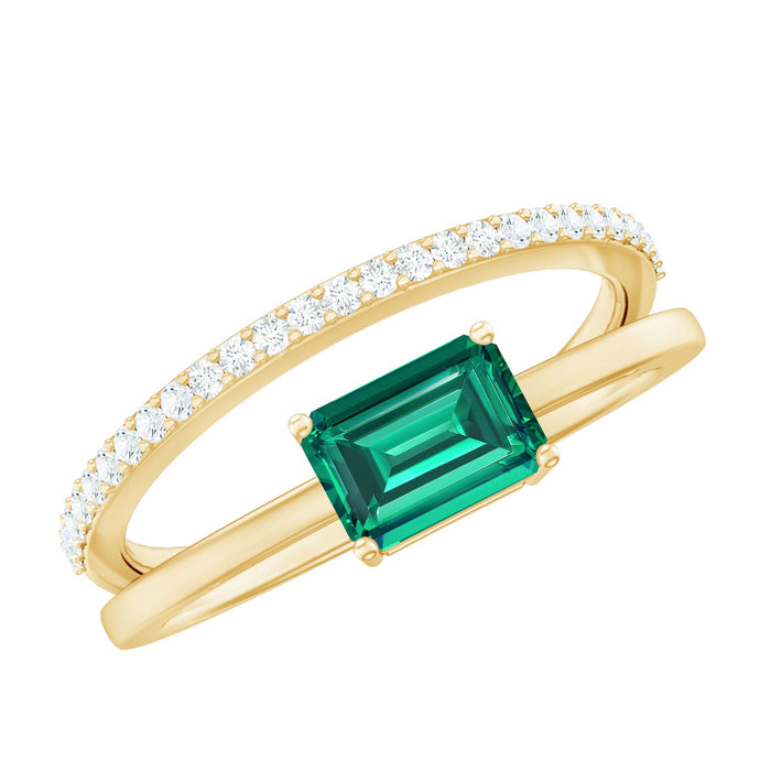 Certified lab-grown emerald east-west engagement ring by Rosec Jewels with a silver band and sparkling green emerald center stone.