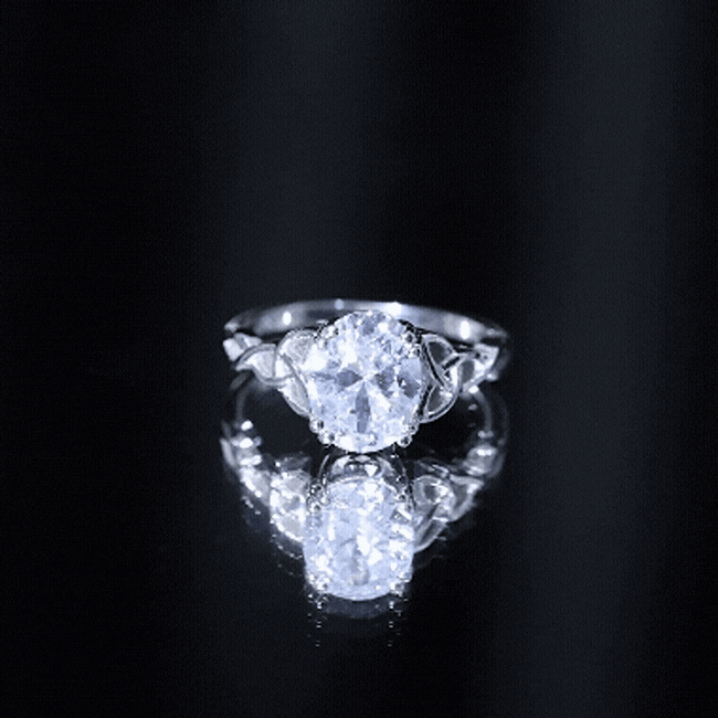 Certified 2 Carat cubic zirconia oval engagement ring with Celtic knot design by Rosec Jewels, featuring a sparkling white stone.