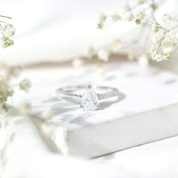 Certified Moissanite Pear Shape Engagement Ring with Side Stones