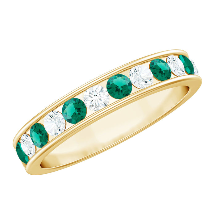 Lab grown emerald and diamond half eternity ring in channel setting, crafted by Rosec Jewels, showcasing sparkling gemstones and elegant design.