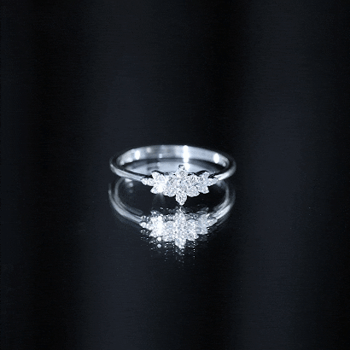 Yellow gold flower-shaped promise ring with certified diamonds by Rosec Jewels, featuring a delicate floral design.