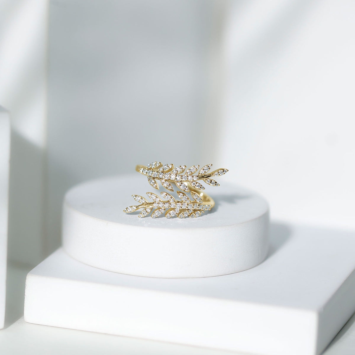 Certified Moissanite Leaf Wrap Ring for women featuring a detailed leaf design, sparkling moissanite stones, and silver-toned band.