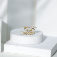 Certified Moissanite Leaf Wrap Ring for women featuring a detailed leaf design, sparkling moissanite stones, and silver-toned band.