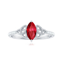 Lab grown ruby Celtic knot ring with diamond accents, featuring a 0.75 carat ruby and intricate design by Rosec Jewels.