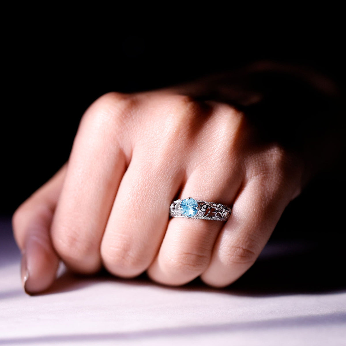 Vintage-style 0.8 carat aquamarine and diamond engagement ring by Rosec Jewels, featuring intricate detailed band and sparkling stones.