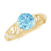 Vintage style aquamarine and diamond engagement ring by Rosec Jewels featuring a 0.8 carat center stone and intricate band design.