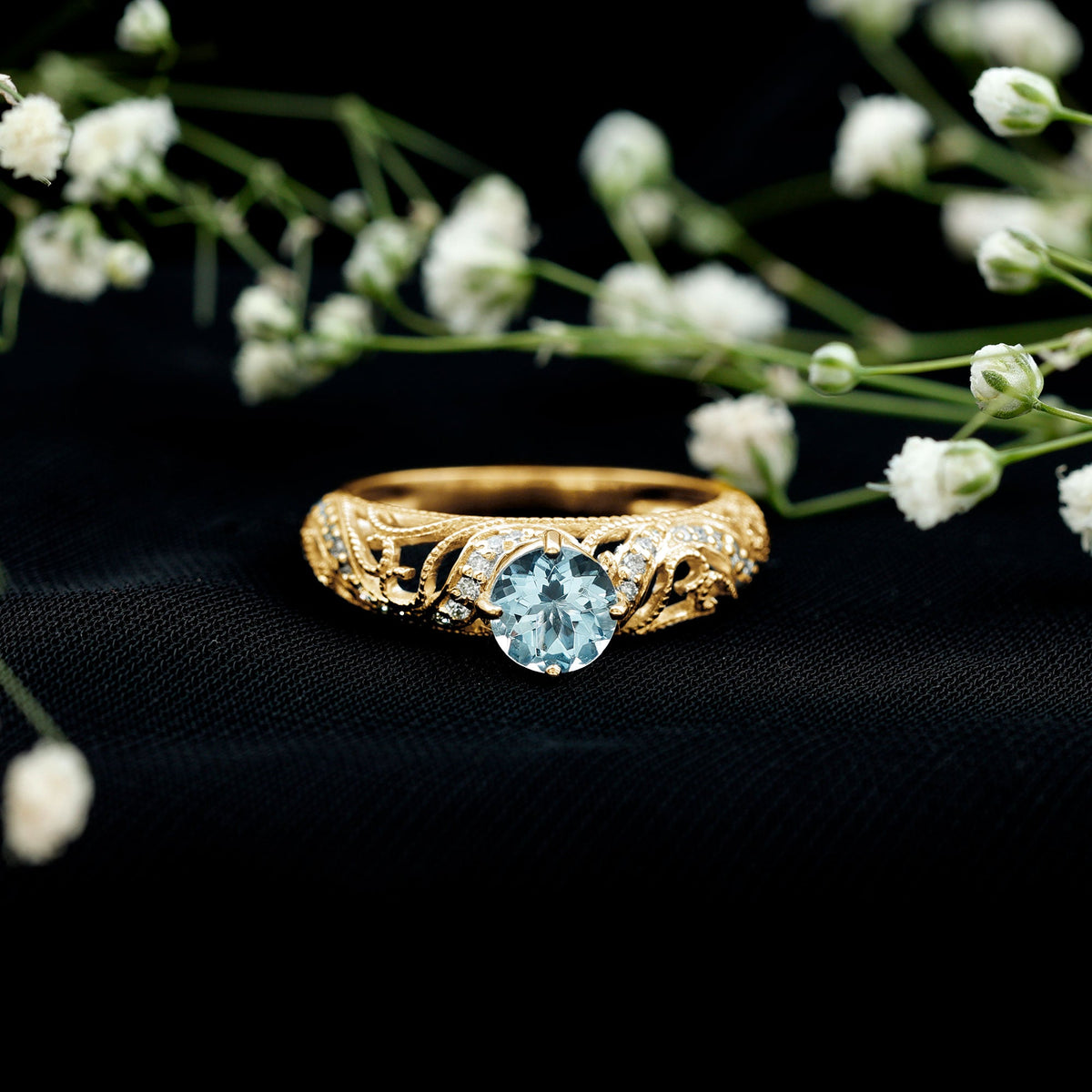 Vintage style aquamarine and diamond engagement ring with 0.8 carats, featuring intricate design from Rosec Jewels.