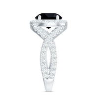Black onyx crossover engagement ring with moissanite halo from Rosec Jewels, showcasing a 2-carat center stone and intricate design.