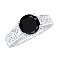 Vintage black spinel diamond engagement ring with Celtic knot design by Rosec Jewels, showcasing intricate craftsmanship and elegant style.