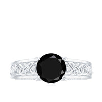 Vintage black spinel and diamond engagement ring with Celtic knot design by Rosec Jewels, showcasing intricate craftsmanship.