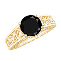 Vintage black spinel and diamond engagement ring with Celtic knot design by Rosec Jewels, showcasing intricate metalwork and sparkling stones.