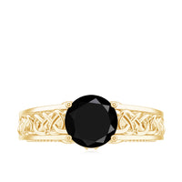 Vintage black spinel and diamond engagement ring with Celtic knot design by Rosec Jewels, close-up of detailed craftsmanship.