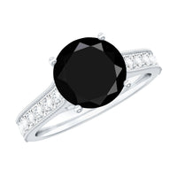 Natural black spinel solitaire engagement ring with diamond side stones, featuring a sleek band and elegant design by Rosec Jewels.