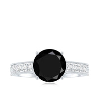 Natural black spinel solitaire engagement ring with diamond side stones, featuring a sleek band and elegant design by Rosec Jewels.