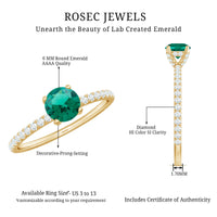 Lab grown emerald solitaire engagement ring with diamond accents from Rosec Jewels, showcasing a stunning green gemstone and elegant band.
