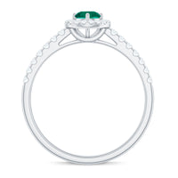 Certified lab-grown emerald diamond halo engagement ring by Rosec Jewels featuring a central emerald surrounded by sparkling diamonds.