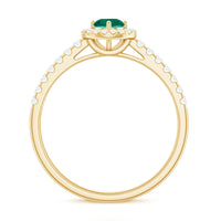 Certified lab-grown emerald diamond halo engagement ring with rose gold band, featuring a central emerald and surrounding diamonds.