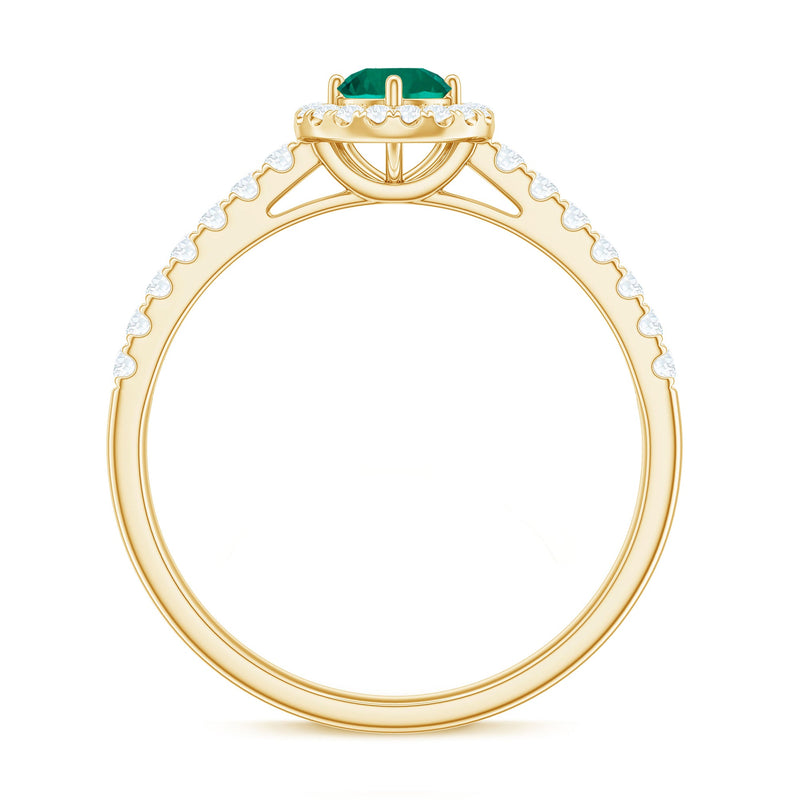 Certified lab-grown emerald diamond halo engagement ring with rose gold band, featuring a central emerald and surrounding diamonds.