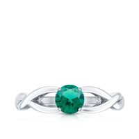 Certified lab-grown emerald crossover ring with diamonds from Rosec Jewels, featuring vibrant green emeralds and sparkling diamonds.