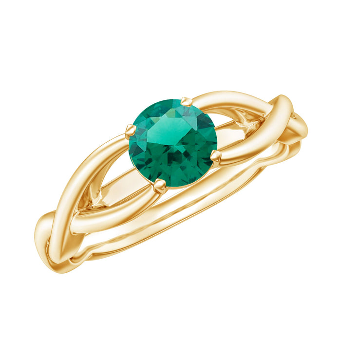 Rosec Jewels certified lab-grown emerald crossover ring with sparkling diamonds, showcasing intricate design and vibrant green stones.