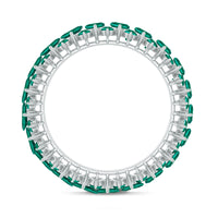 Certified lab-grown emerald eternity ring by Rosec Jewels featuring a continuous row of sparkling emeralds in a silver band.