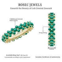 Rosec Jewels certified lab-grown emerald eternity ring with sparkling green gemstones and a continuous band design.