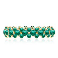 Certified lab-grown emerald eternity ring by Rosec Jewels featuring a continuous row of sparkling green emeralds in a sleek band.