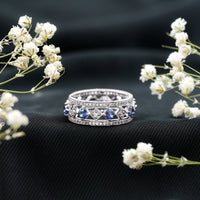 Lab created blue sapphire and diamond full eternity band ring from Rosec Jewels, showcasing sparkling gemstones around the band.