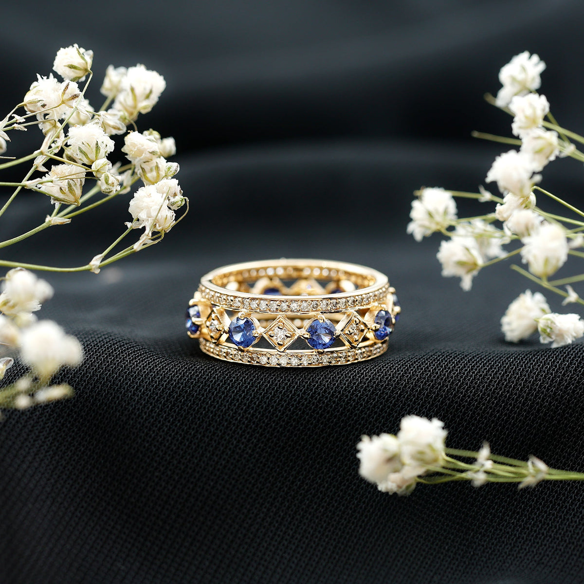 Lab-created blue sapphire and diamond full eternity band ring by Rosec Jewels, featuring a continuous row of sparkling gemstones.