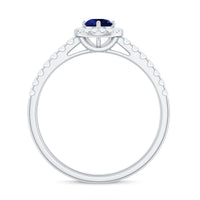 Lab grown blue sapphire diamond engagement ring with halo by Rosec Jewels, featuring a 0.6 carat center stone and elegant band.