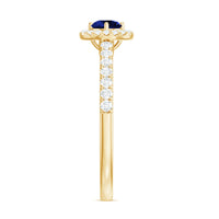 Certified 0.6 carat lab-grown blue sapphire diamond engagement ring with halo setting by Rosec Jewels, showcasing a sparkling center stone.