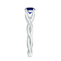Certified 0.6 carat lab-grown blue sapphire promise ring with a surprise diamond, featuring a delicate gold band and elegant design.