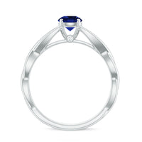 Certified 0.6 carat lab-grown blue sapphire promise ring with a hidden diamond, featuring a Rosec Jewels ring design.