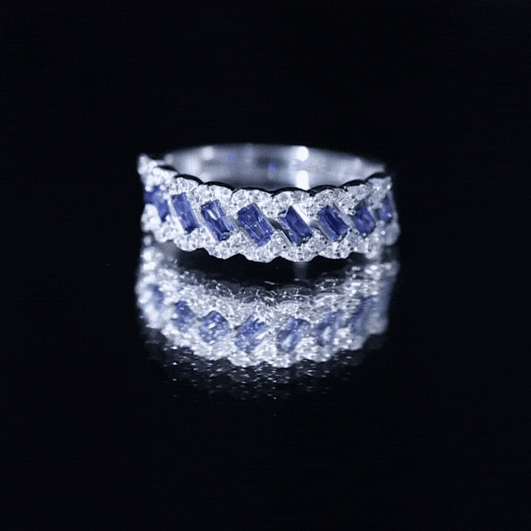 Rosec Jewels blue sapphire and diamond half eternity band ring featuring lab-grown baguette sapphires and sparkling diamonds.